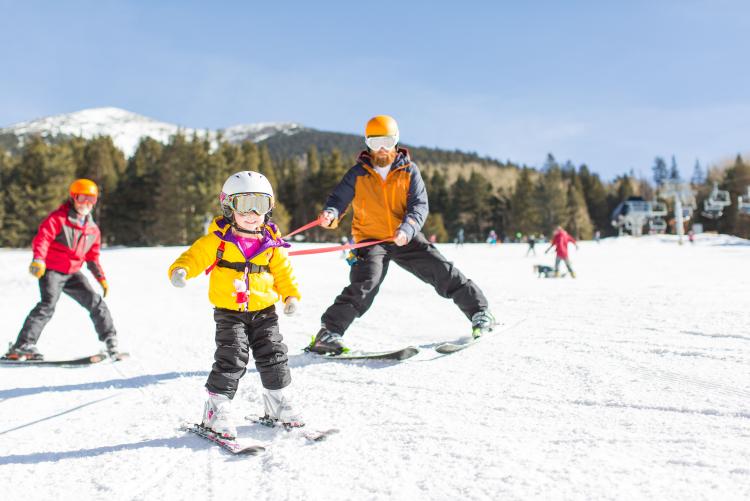 a child learns to ski at the Arizona Snowbowl