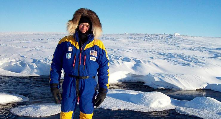 man standing in icy conditions